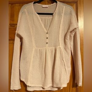 Pink long sleeve waffle knit sweater. Great condition. Only worn a few times.